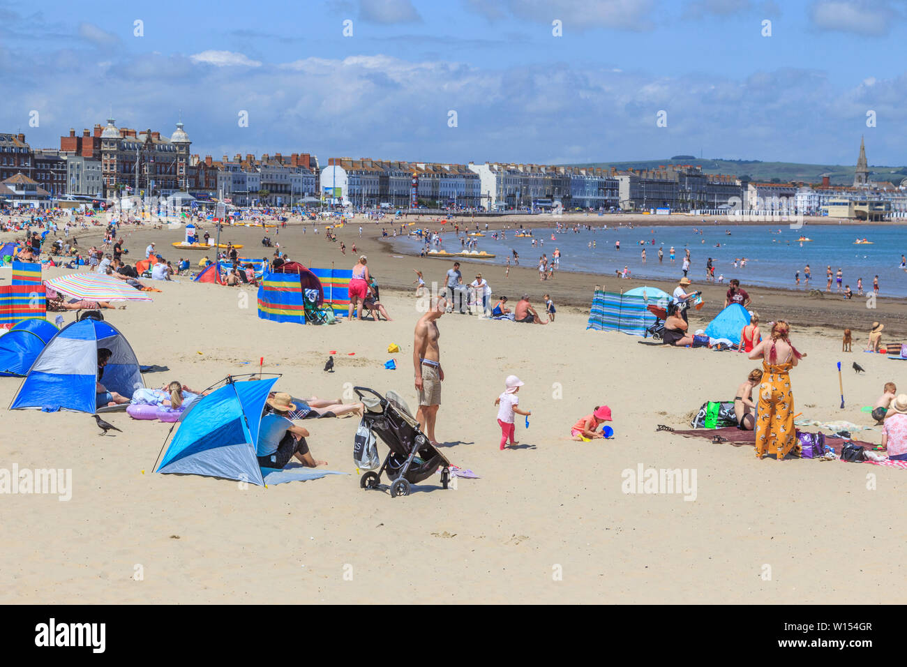 Royaume-uni jours fériés traditionnels plage,ville balnéaire géorgienne weymouth Dorset, Angleterre, uk go Banque D'Images