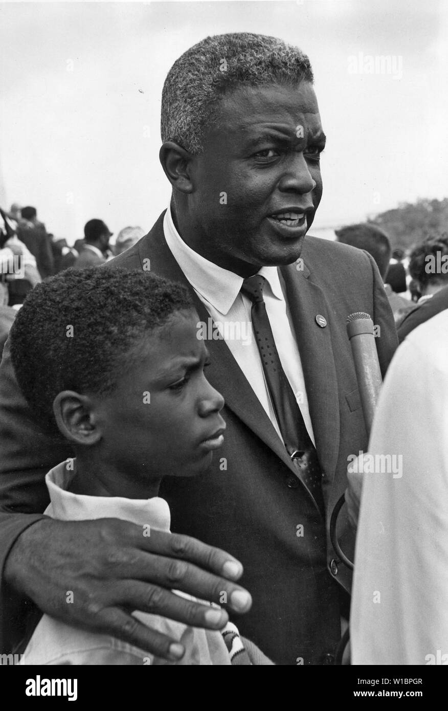 Manifestation à Washington, D.C. [ancien joueur de Ligue nationale de baseball, Jackie Robinson avec son fils.] Banque D'Images