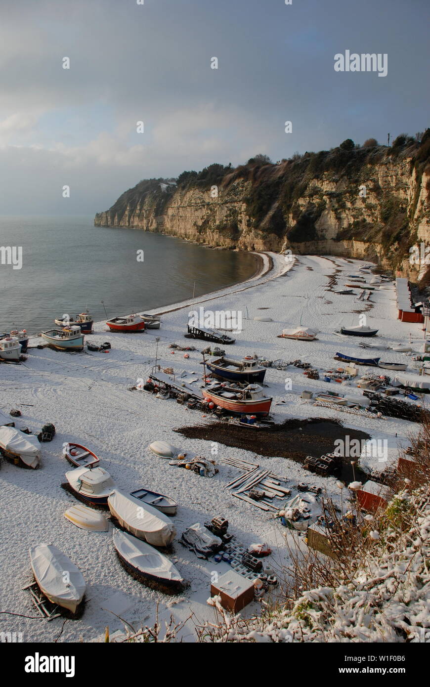 La neige sur la plage de bière, Devon Banque D'Images