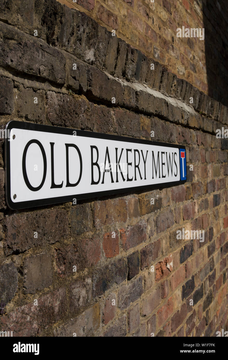 Enseigne de rue ancienne boulangerie mews, Hampton Wick, le sud-ouest de Londres, Angleterre Banque D'Images