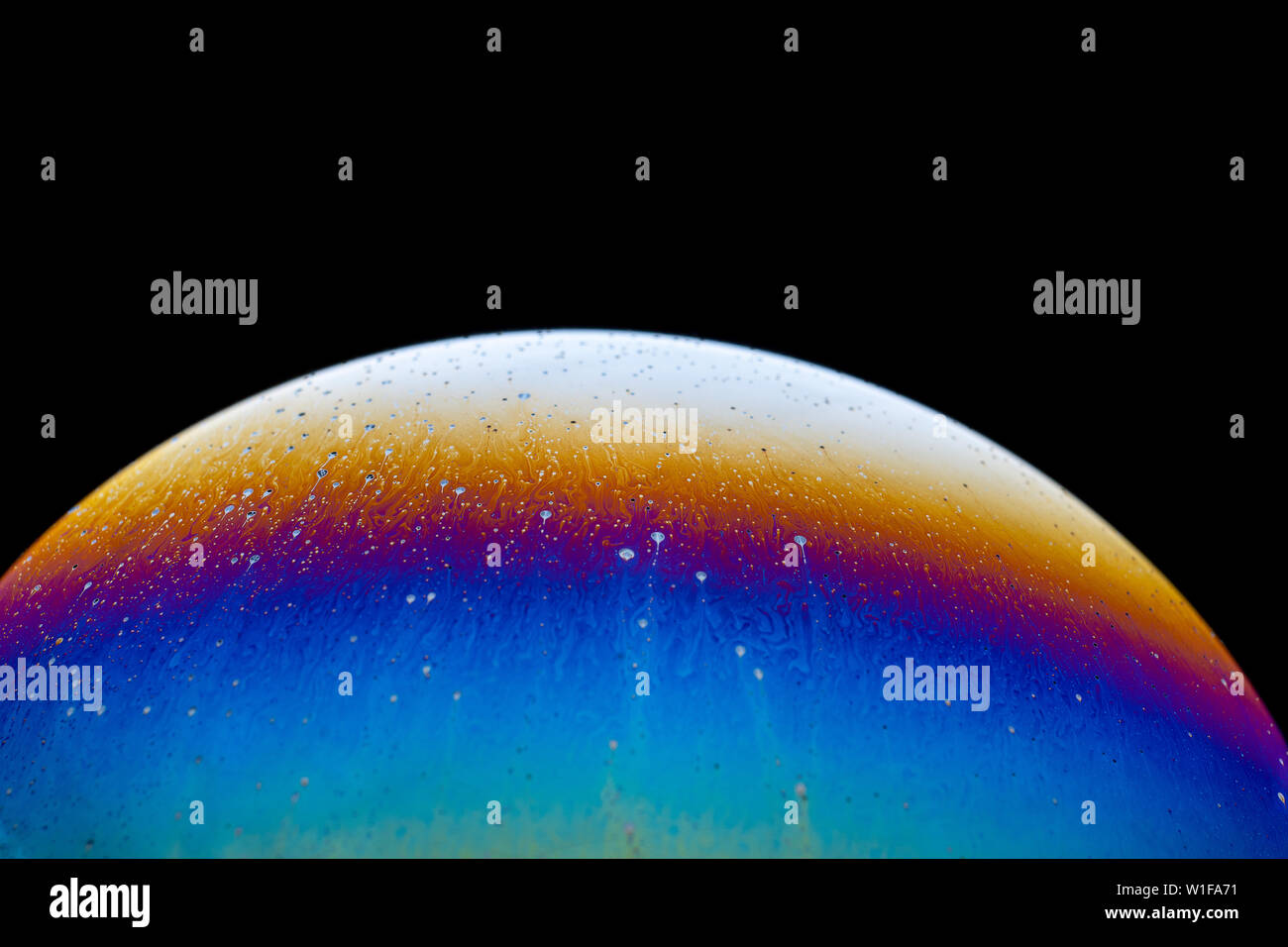 Motif fantaisie incroyable de l'eau savonneuse résumé fond demi-cercle. Modèle de l'univers planètes ou l'espace cosmique. Banque D'Images