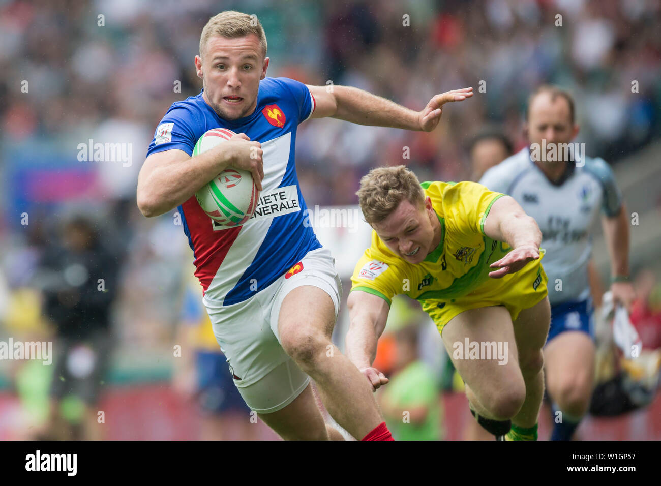 Londres, Royaume-Uni. 26 mai, 2019. L'avant-dernier tournoi du monde HSBC Série de rugby à 7 sur 25 et 26 mai 2019 à Londres (GB). Thibaud Mazzoleni (France, 13) tente d'échapper à son adversaire de l'Australie. Credit : Jürgen Kessler/dpa/Alamy Live News Banque D'Images