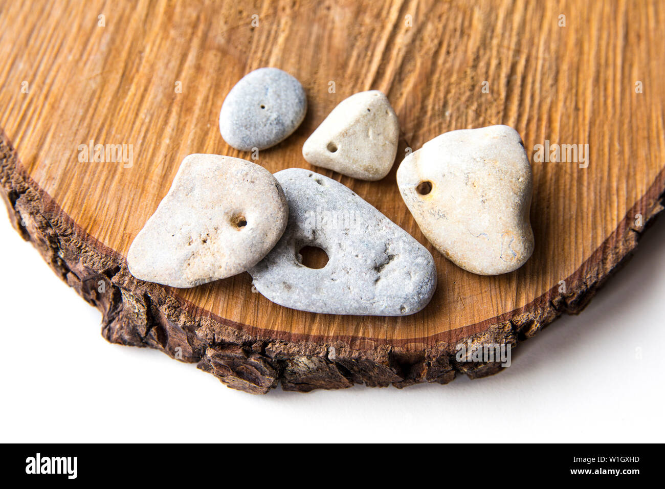 Hag sacré-pierres naturelles pierres naturelles avec un trou à travers, on croit être sacré. Aussi connu sous le nom de Witch, Adder, des oeufs de serpent, Hex, Conte, saint, Holeys Banque D'Images