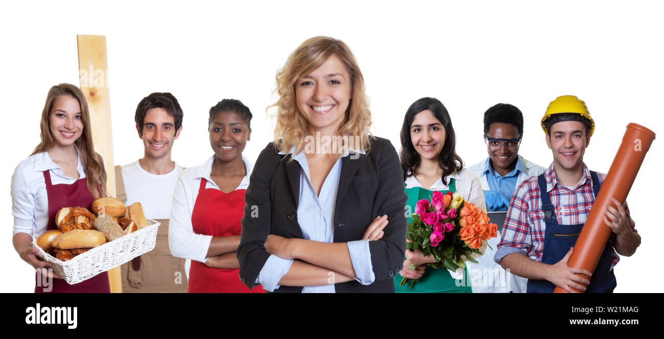 Les jeunes femmes d'affaires du groupe de stagiaire avec d'autres apprentis sur un fond blanc pour découper Banque D'Images