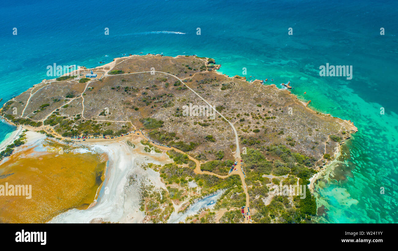 Vue aérienne de Puerto Rico. Faro Los Morrillos de Cabo Rojo. Playa Sucia beach et lacs de sel à Punta Jaguey. Banque D'Images