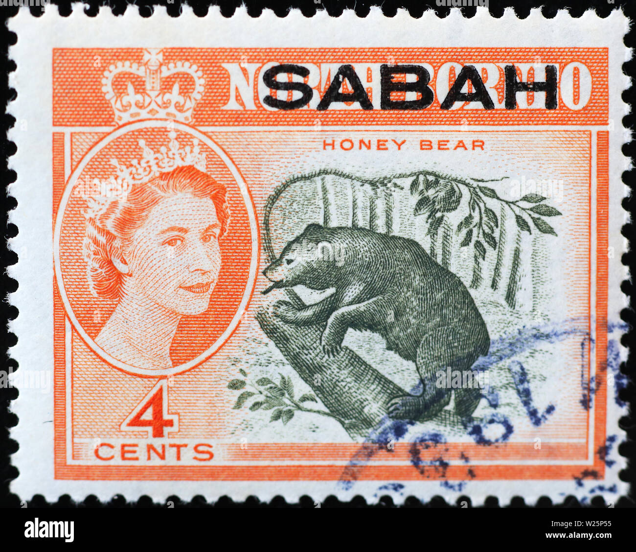 Ours miel sur de très vieux stamp de Bornéo Banque D'Images