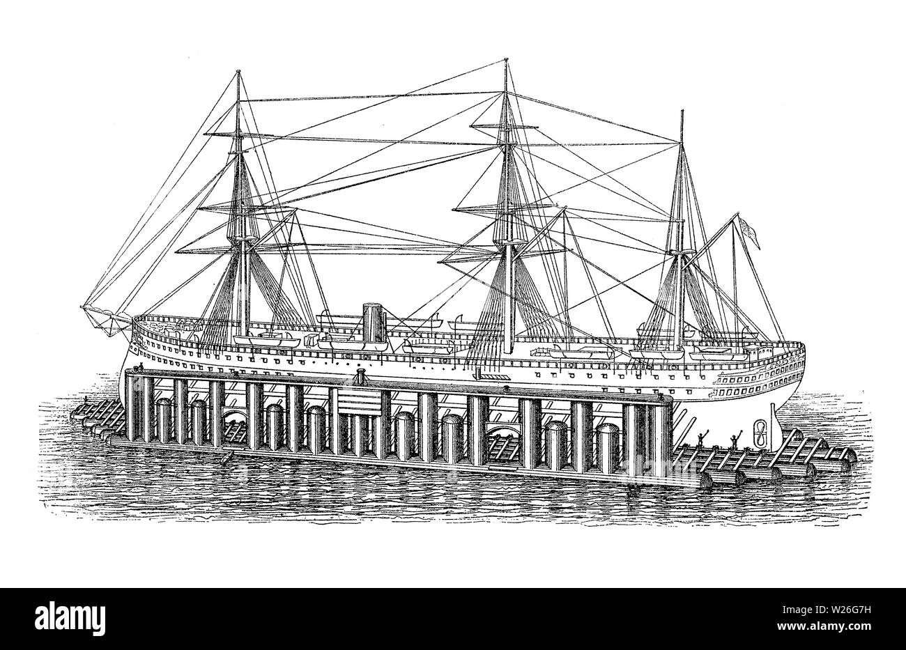 Vapeur sur un quai flottant habituellement tenu en place par des poteaux verticaux, un ponton flottant et la plate-forme de travail pour la réparation et opérations careen Banque D'Images