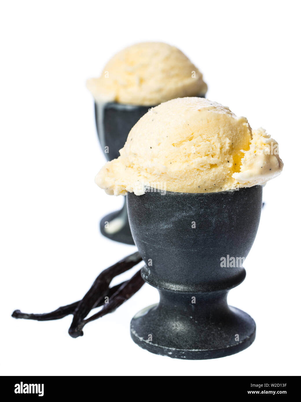 Coupe de glaces : deux boules de glace vanille en cm Banque D'Images