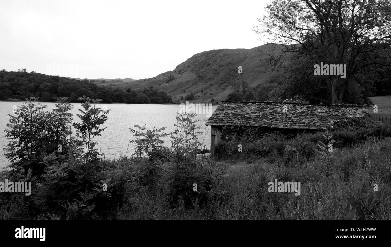 Un hangar à bateaux à côté de Grasmere dans le Parc National du Lake District, Cumbria, Royaume-Uni. Banque D'Images