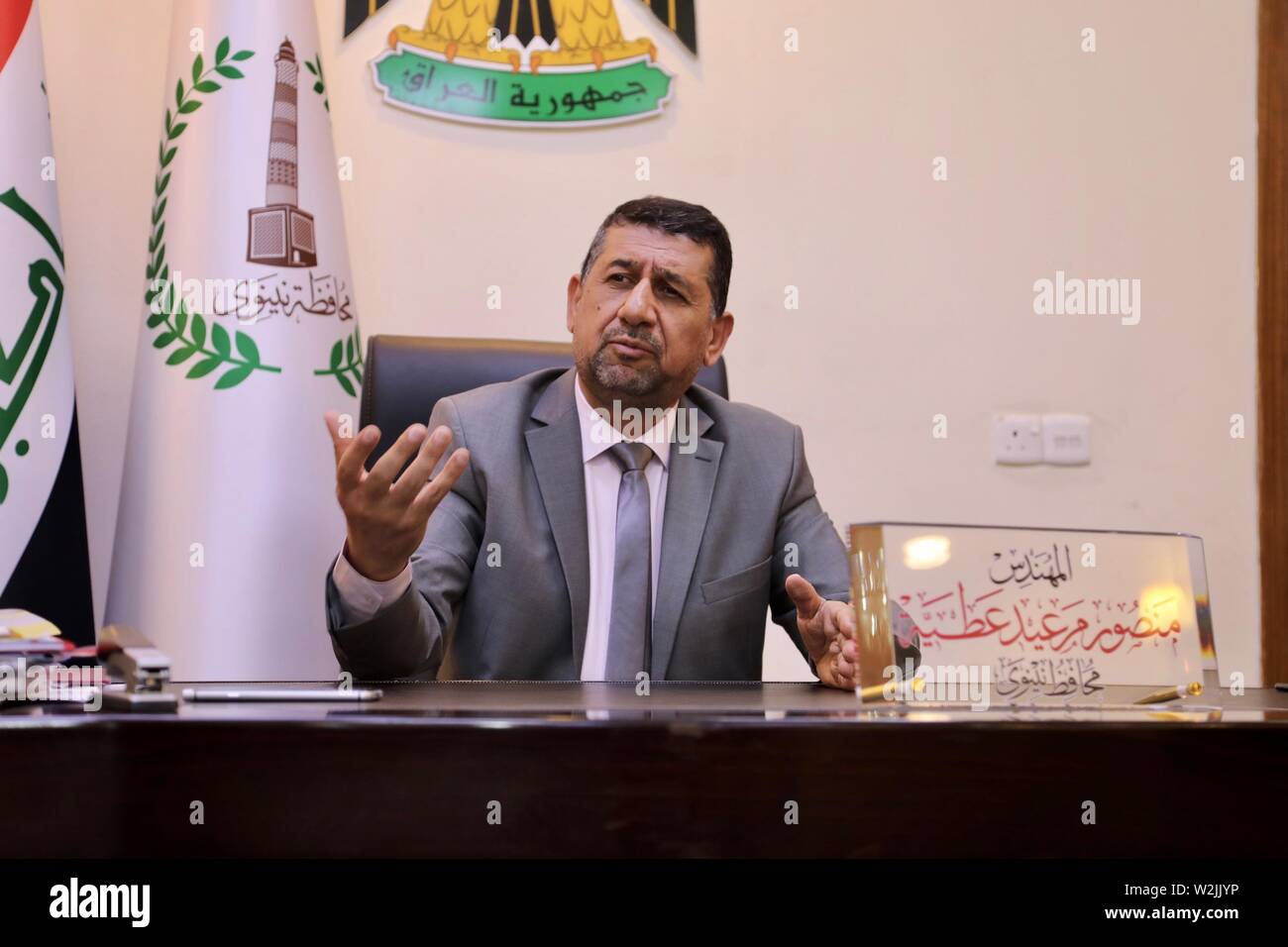 Mossoul, Irak. 2 juillet, 2019. Nouveau gouverneur de Ninive Mansour al-mar'eed parle à Xinhua dans une interview à son bureau dans la province de Ninive, l'Iraq, le 2 juillet 2019. Le gouverneur de province du nord de l'Iraq de Ninive a appelé les entreprises chinoises à participer à la reconstruction de sa capitale Mossoul. Pour ALLER AVEC : gouverneur irakien invite les entreprises chinoises à participer à la reconstruction de Mossoul Crédit : Khalil Dawood/Xinhua/Alamy Live News Banque D'Images