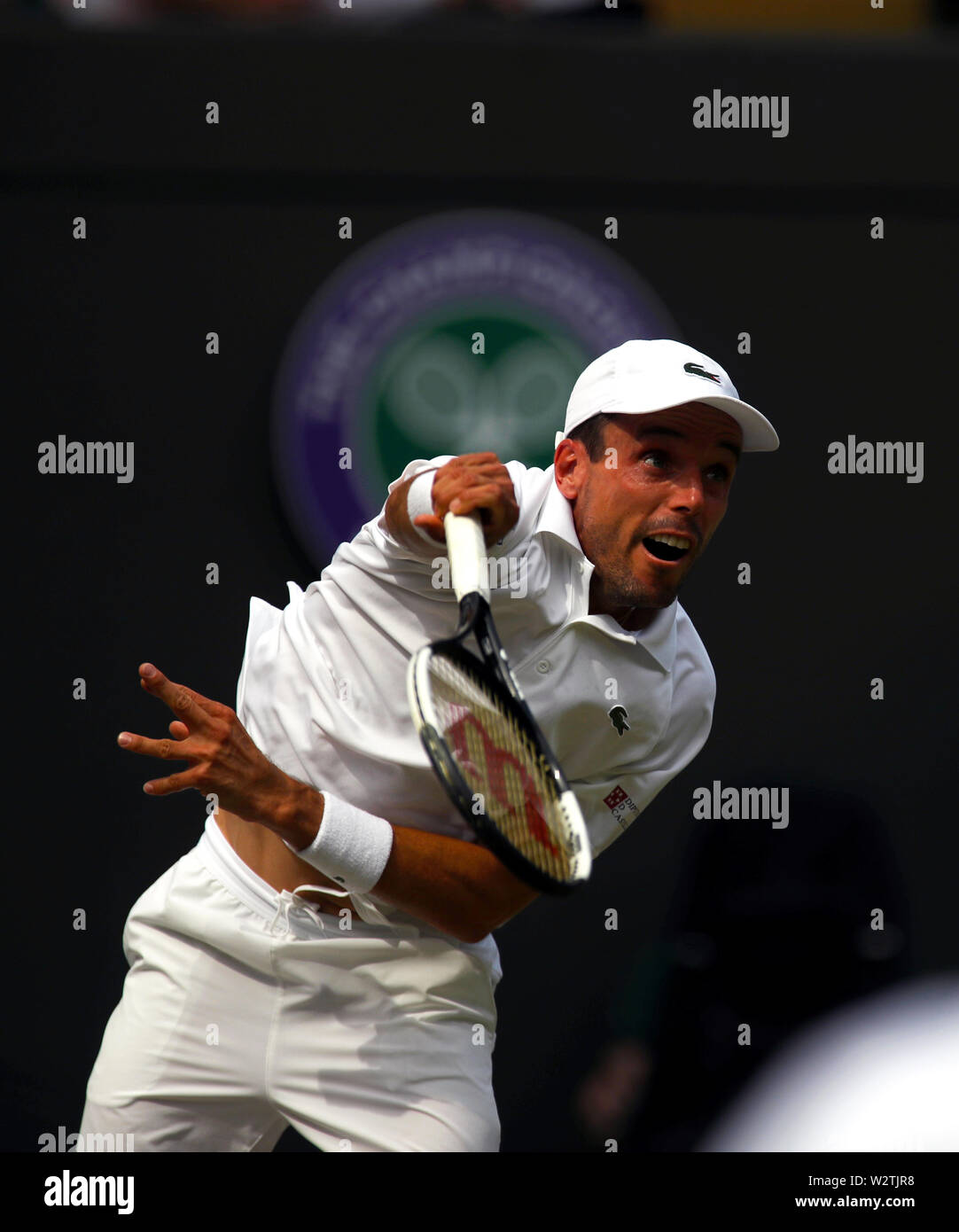Wimbledon, Royaume-Uni. 10 juillet, 2019. Roberto Bautista Agut d'Espagne en poste au cours de l'son quart de match contre Guido Pella de l'Argentine à Wimbledon aujourd'hui. Bautista Agut a gagné en quatre sets à l'avance pour les demi-finales. Crédit : Adam Stoltman/Alamy Live News Banque D'Images