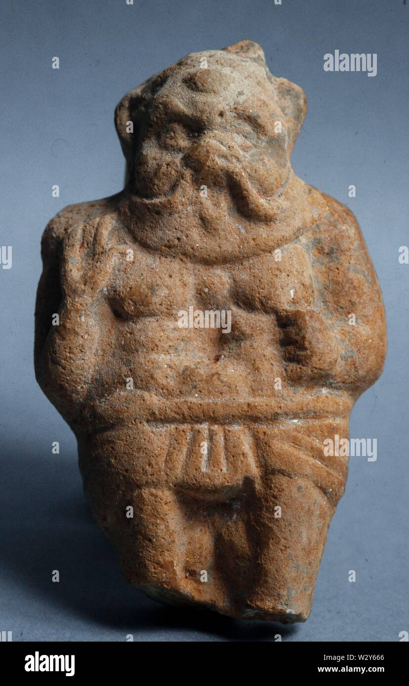 Terracota del dios, Bes deidad protectora fenicia. Musée : Museu d'Ullastret. Banque D'Images