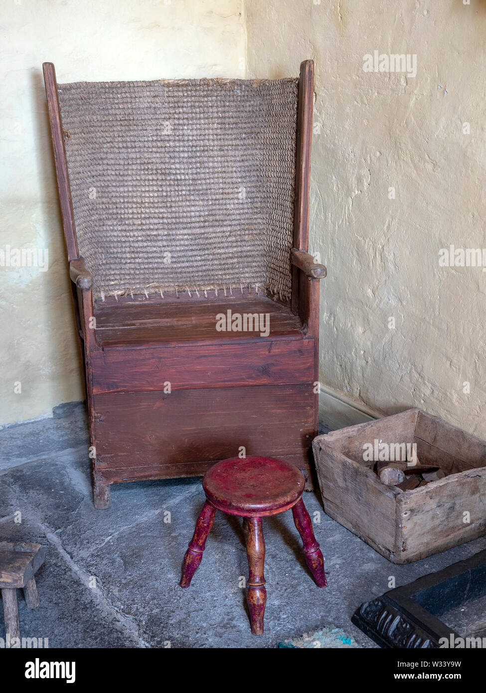 Une chaise Orcades dans un bâtiment restauré croft house sur Sanday, Orkney Islands Banque D'Images