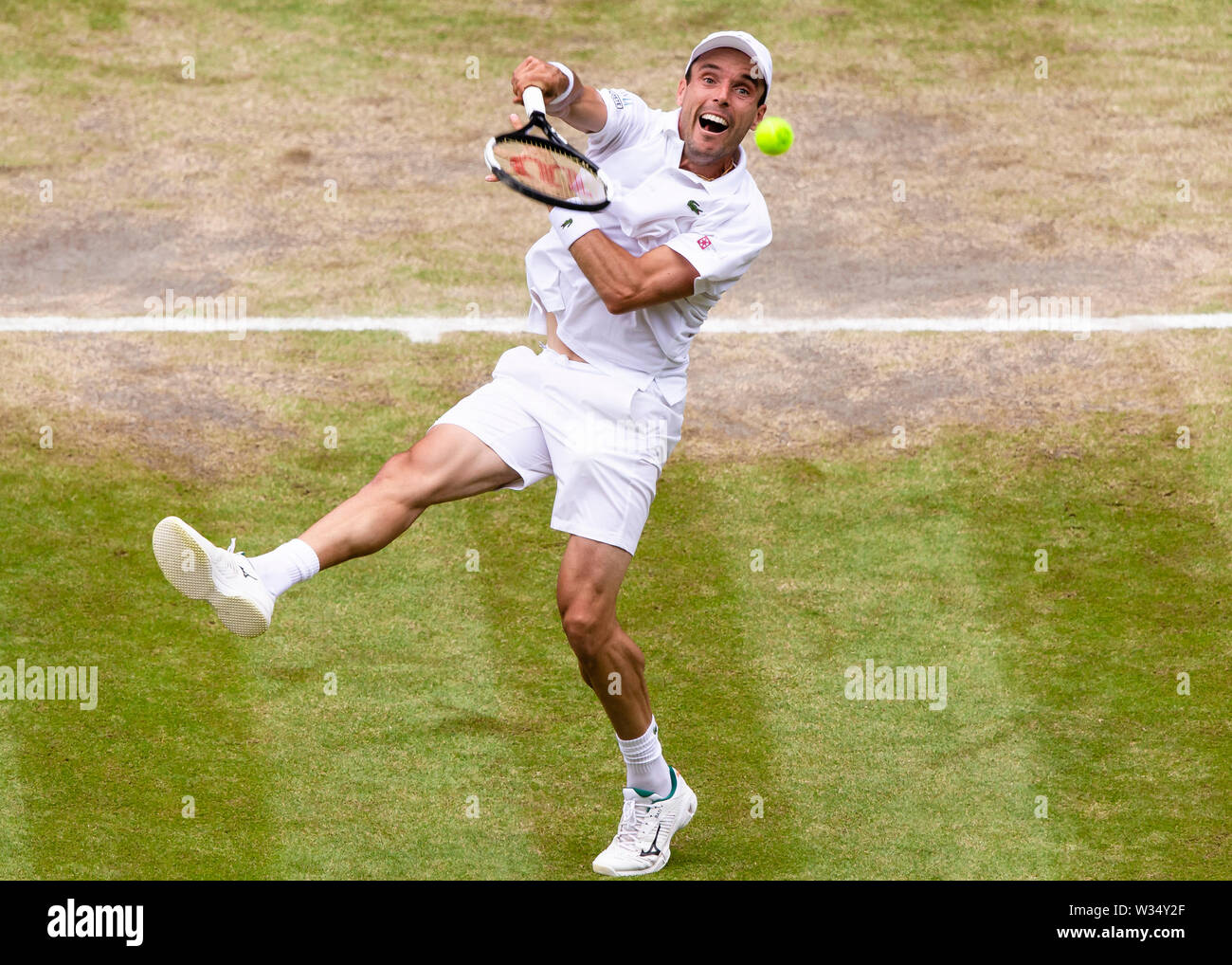 Londres, Royaume-Uni. 12 juillet, 2019. Roberto Bautista-Agut de l'Espagne est dans l'action au jour 11 au tennis de Wimbledon 2019 au All England Lawn Tennis et croquet Club à Londres. Crédit : Frank Molter/Alamy Live News Banque D'Images