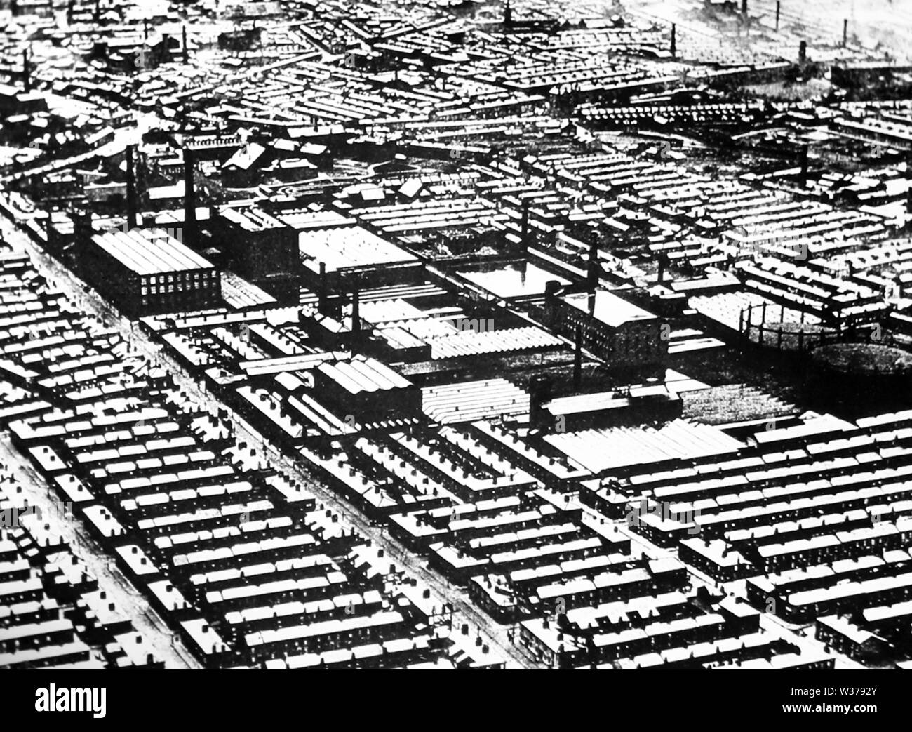 Les travailleurs d'usine et maisons Banque D'Images