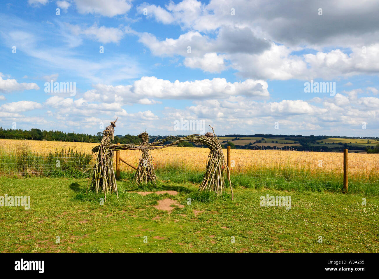 Trois Fées Sculpture, les hommes du roi, le cercle de pierres de Rollright Stones, Pierre Cour, Grande Rollright, Chipping Norton, Oxfordshire, UK Banque D'Images