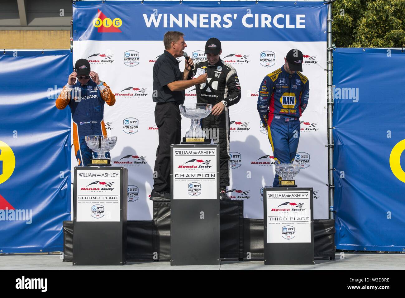 Toronto, Ontario, Canada. 14 juillet, 2019. SIMON PAGENAUD (22), Scott Dixon (9) et Alexander ROSSI (27) célèbrent remportant dans la série Indycar VERIZON Honda Indy Toronto de course qui s'est tenue à Toronto, Canada Crédit : Angel Marchini/ZUMA/Alamy Fil Live News Banque D'Images