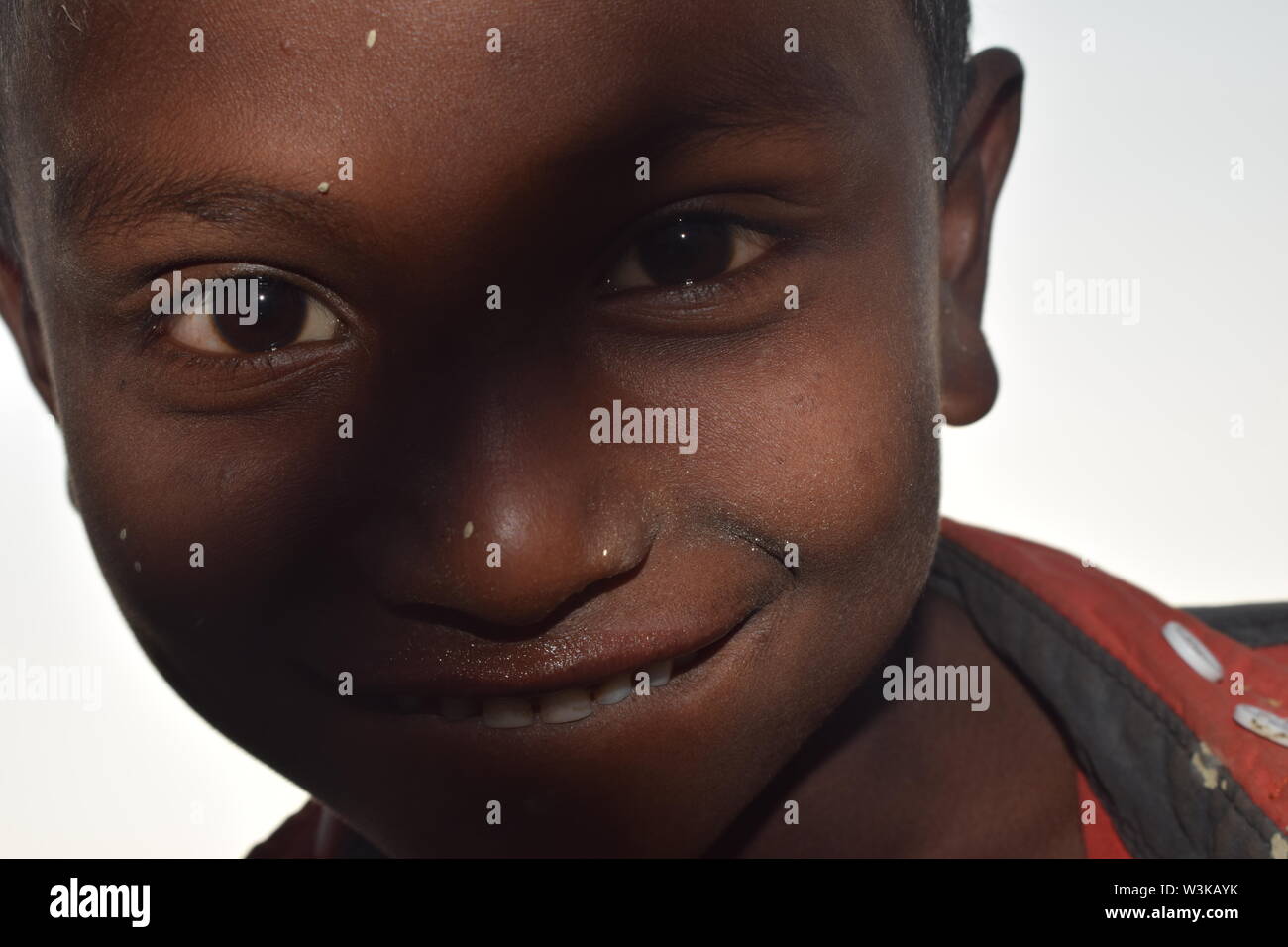 Enfant travailleur sourire Banque D'Images