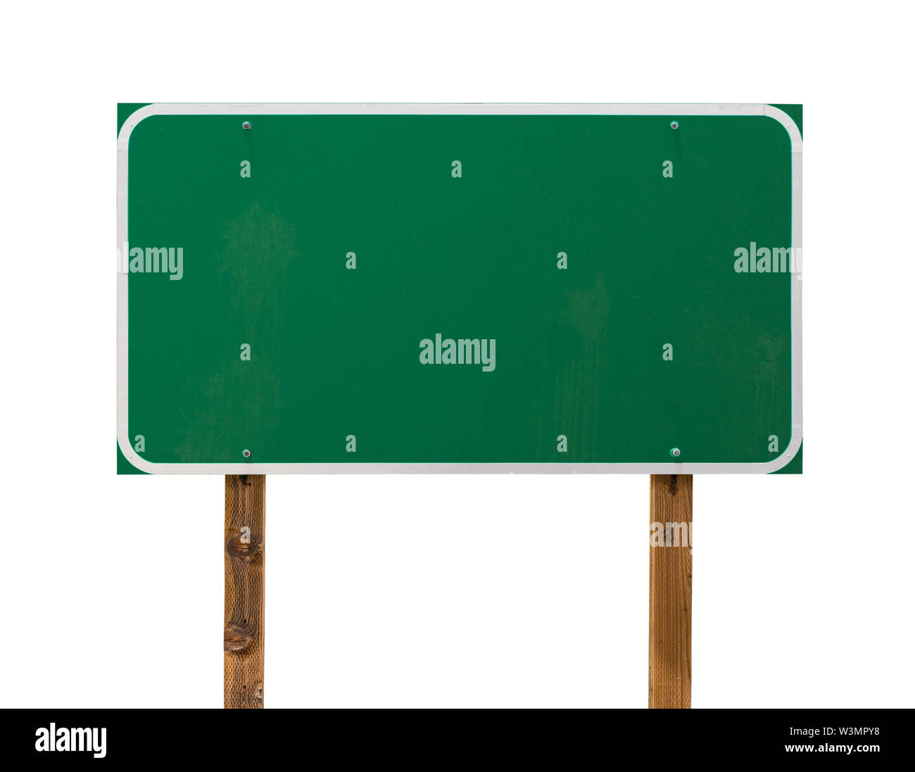 Blank panneau vert avec piquets en bois isolé sur un fond blanc. Banque D'Images