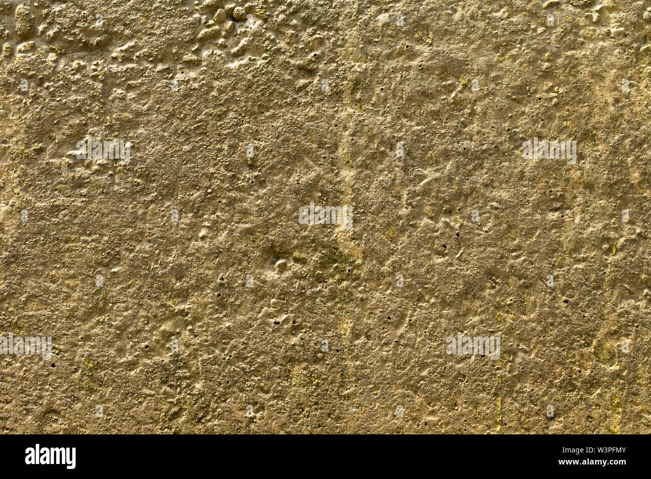 Mur de béton qui est peint en jaune Banque D'Images