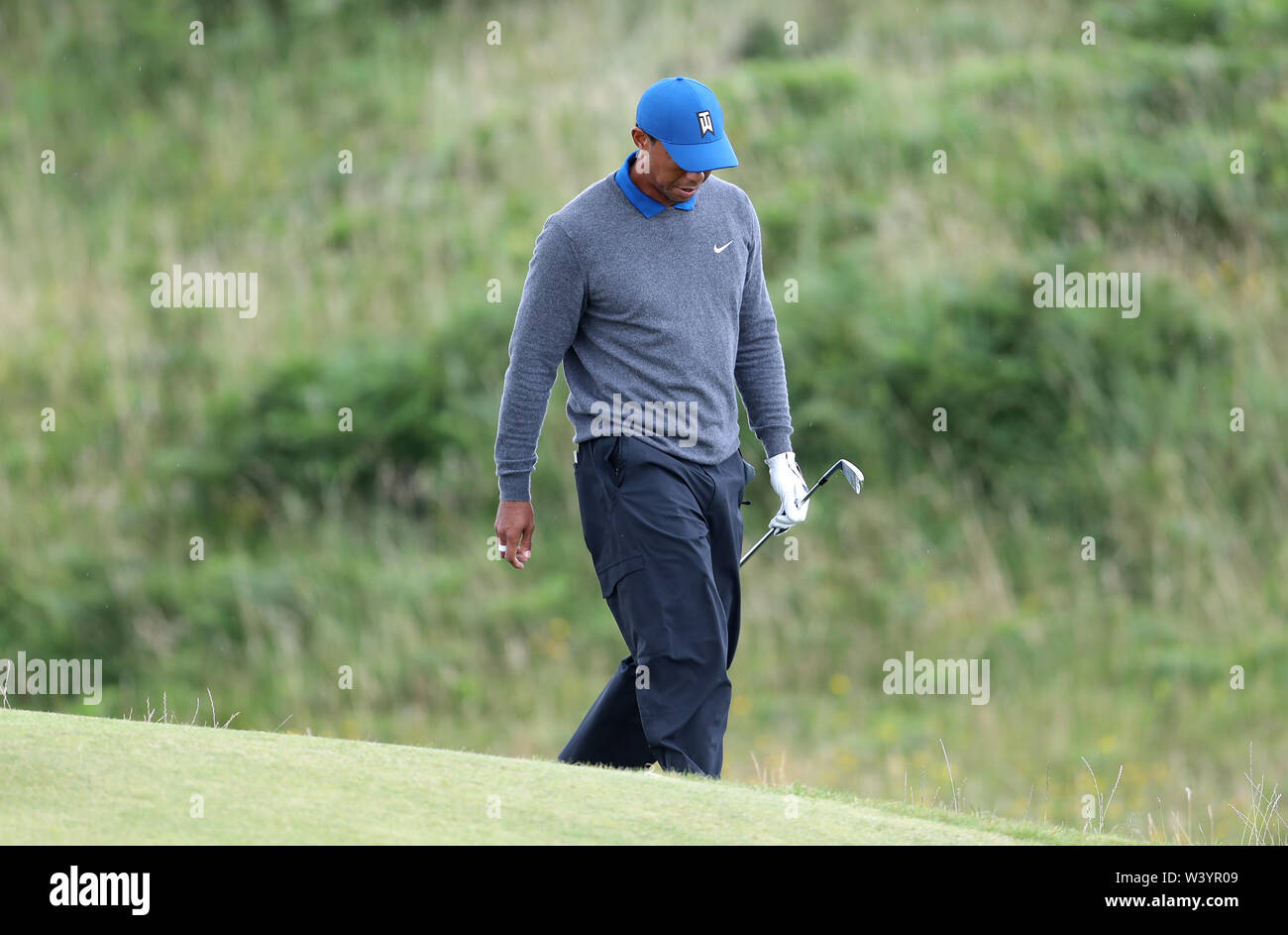 USA's Tiger Woods fait abattus sur la 9e vert sur au cours de la première journée du championnat ouvert en 2019 au Club de golf Royal Portrush. Banque D'Images