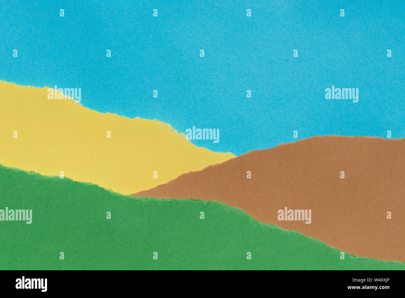Des morceaux de papier déchiré : texture de fond vert, jaune, bleu couleurs Banque D'Images
