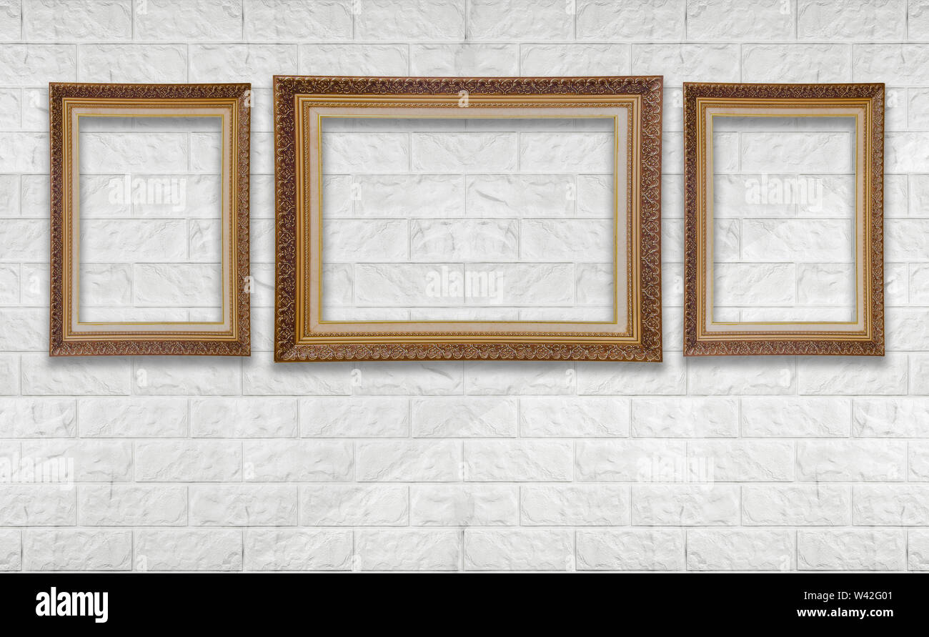 Cadre photo blanc classique moderne blanc sur mur de brique en showroom et galerie. Banque D'Images