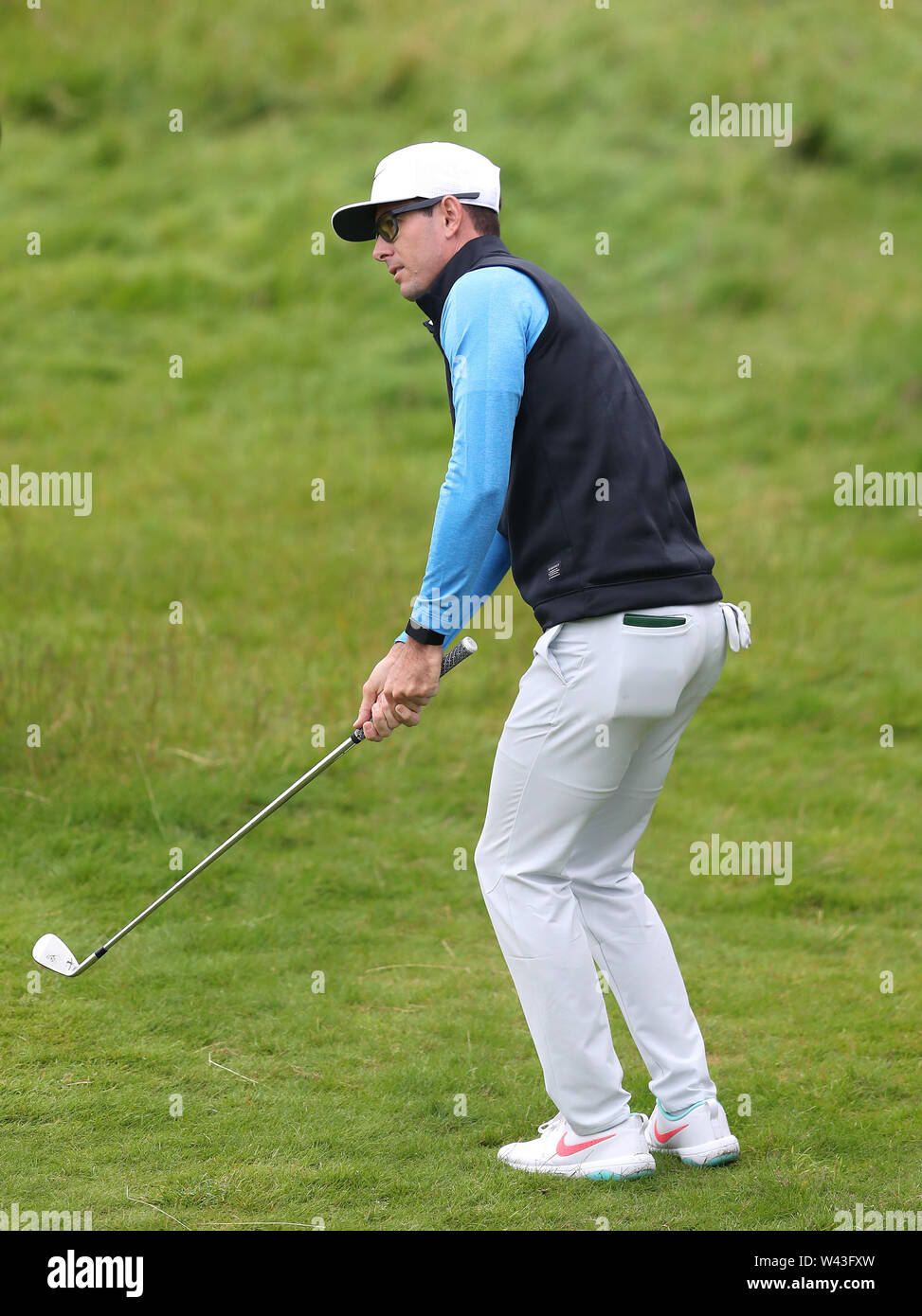 Dylan Frittelli de l'Afrique du Sud sur le 18ème green au cours de la deuxième journée de l'Open Championship 2019 au Club de golf Royal Portrush. Banque D'Images