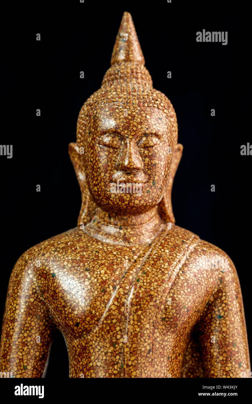 Sculpture en pierre Bouddha close-up de tête en arrière-plan Banque D'Images