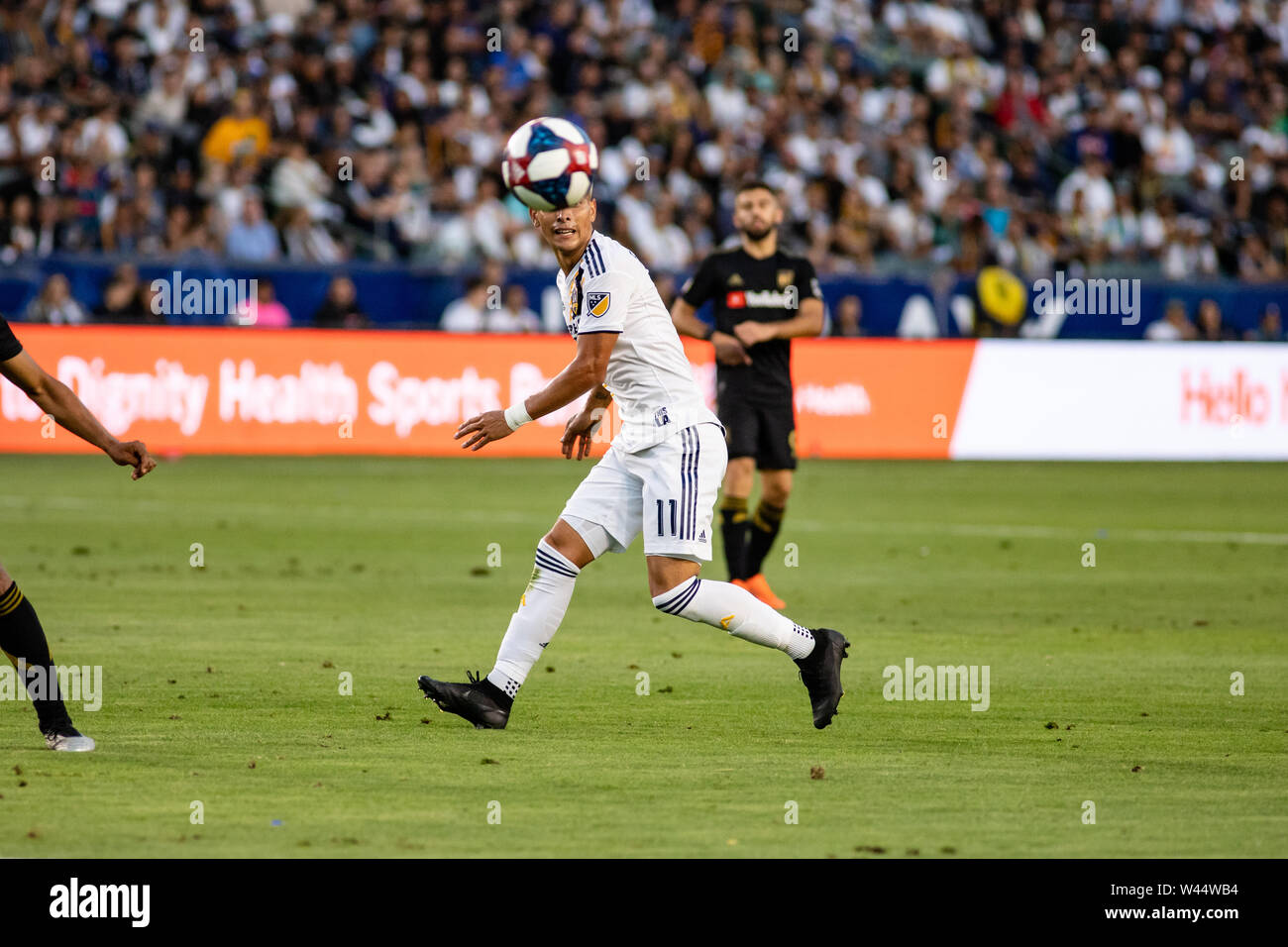 Carson, Californie, USA. 19 juillet, 2019. Yeux sur la balle. Favio Alvarez (11) pendant l'El Trafico, le derby de Los Angeles. Crédit : Ben Nichols/Alamy Live News Banque D'Images