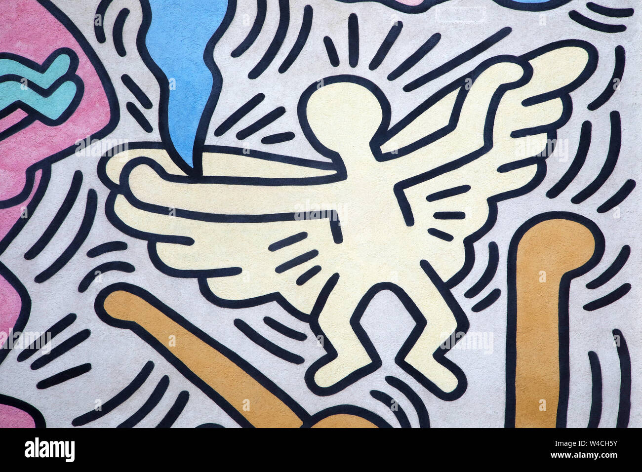 Angel peinte par Keith Haring. Détail d'une grande oeuvre d'art (appelé Tuttomondo) peint à Pise, Italie, en 1989. Banque D'Images