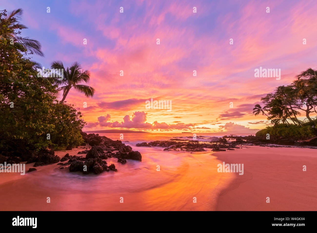 Plage secrète au coucher du soleil, Maui, Hawaii, USA Banque D'Images