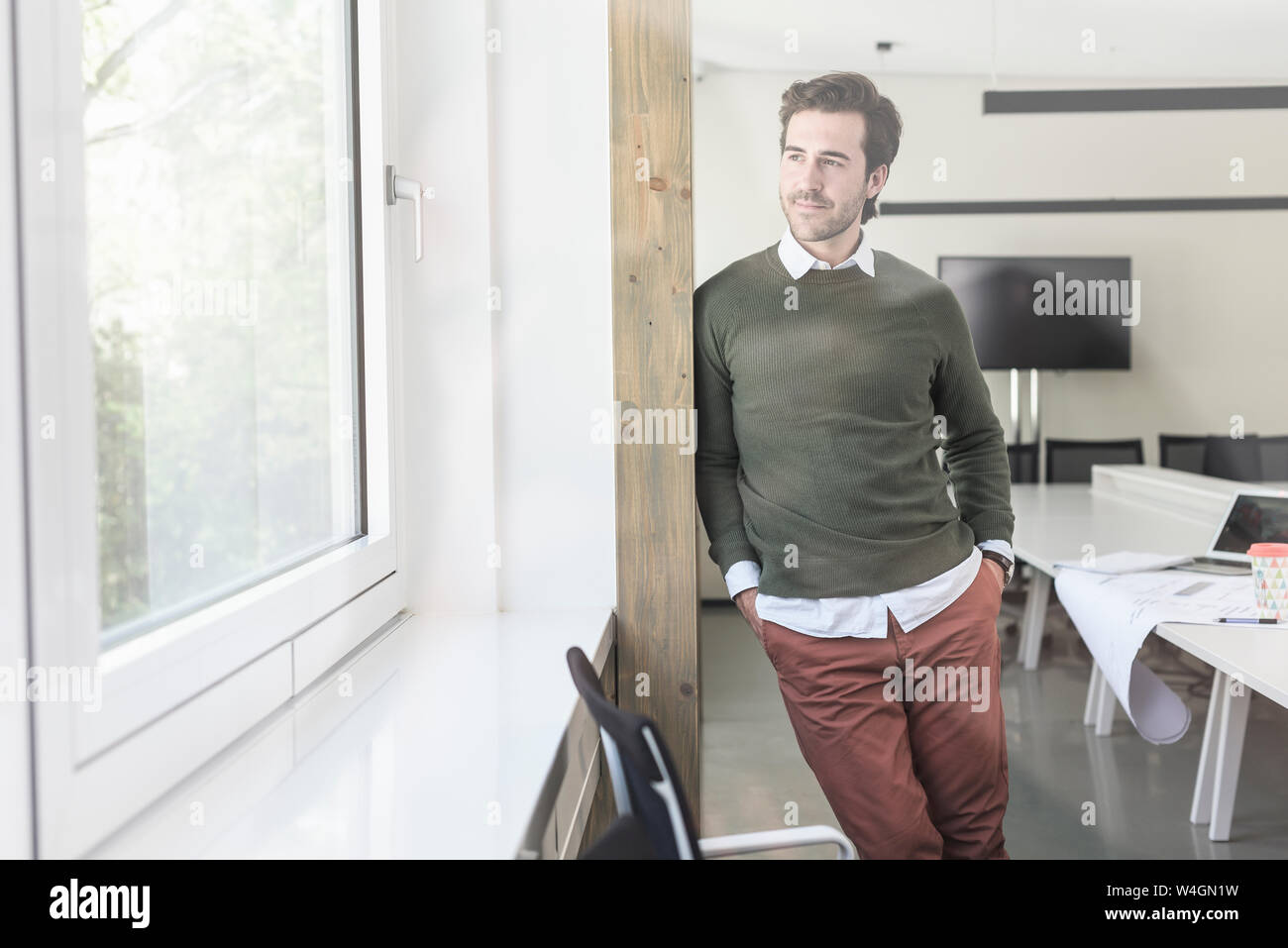 Succès, young businessman in boardroom Banque D'Images