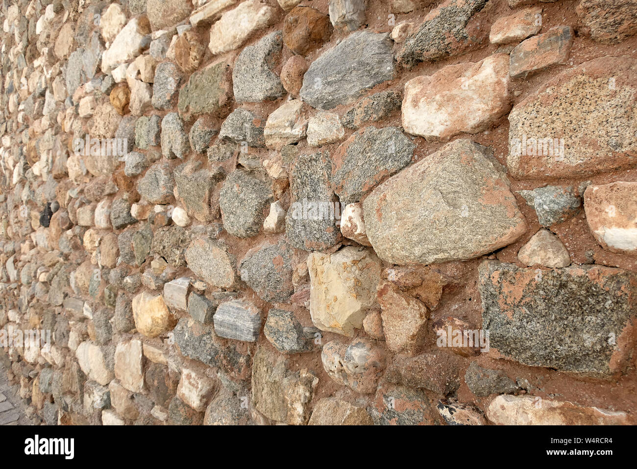 Vue de détail d'un mur de roche texturé Banque D'Images