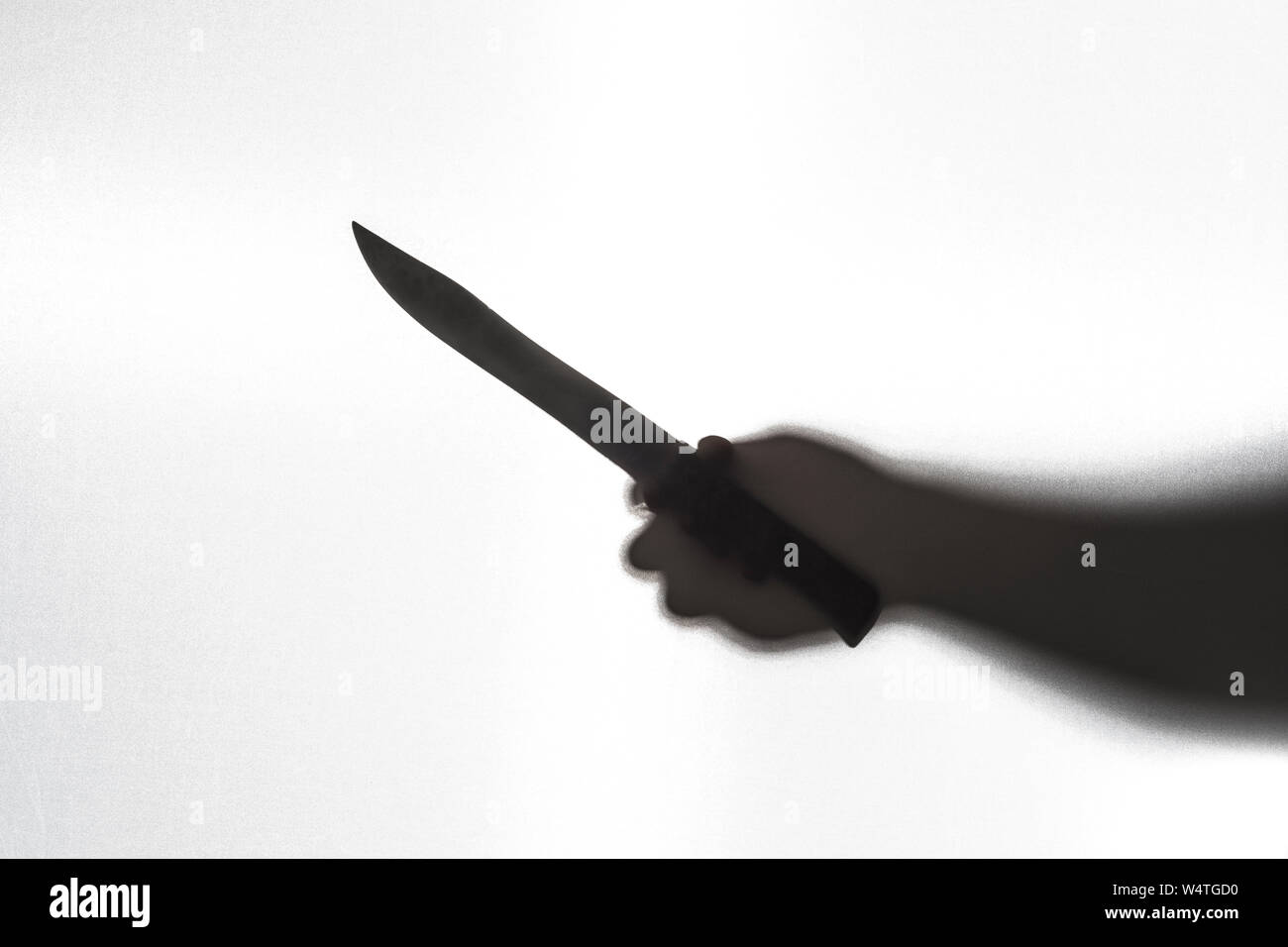 Silhouette de l'assassinat à l'aide d'un couteau. Concept de la peur. Banque D'Images