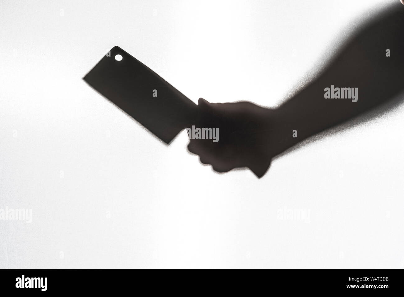 Silhouette de l'assassinat à l'aide d'un couteau. Concept de la peur. Banque D'Images