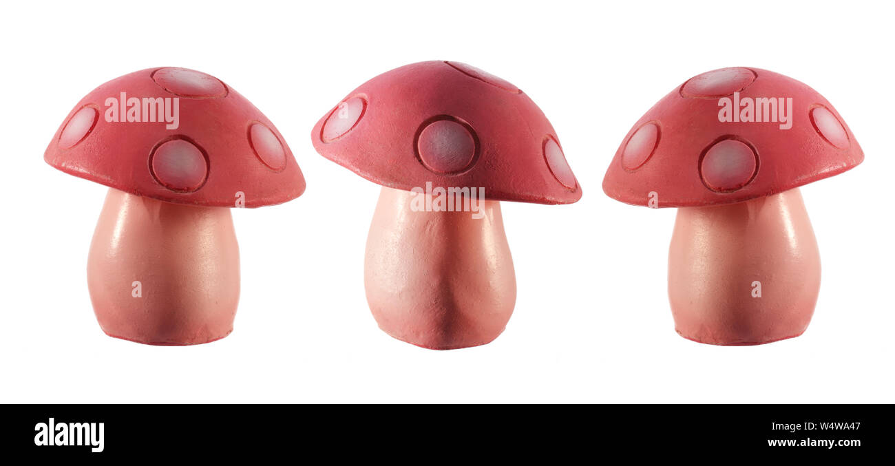 Figurines de champignons sur fond blanc Banque D'Images