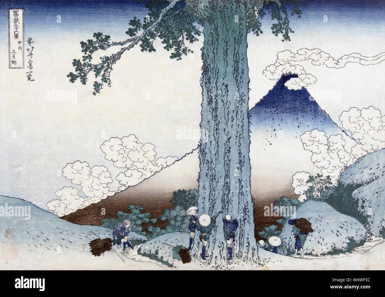 Col de montagne Mishima dans la province de Kai, Japon, montrant le Mt Fuji. Après une gravure sur bois datant de vers 1830 par l'artiste japonais Katsushika Hokusai, 1760 - 1849. La gravure sur bois fait partie d'une série connue sous le nom de trente-six vues du Mont Fuji. Banque D'Images