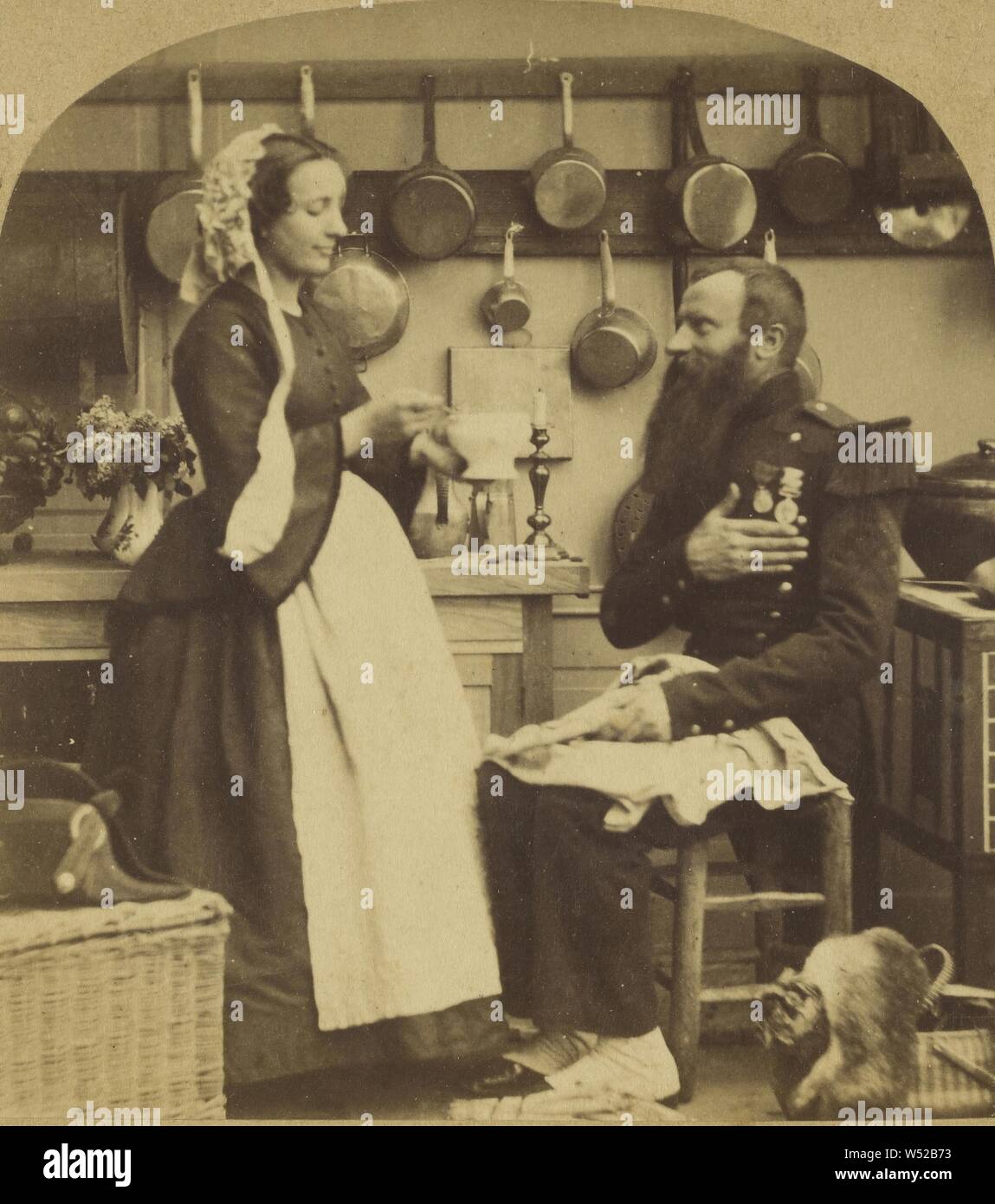 Homme barbu en tenue militaire assis alimenté par une femme de soupe dans une cuisine, attribuée à London Stereoscopic Company (Actif 1854 - 1890), vers 1860, à l'albumine argentique Banque D'Images