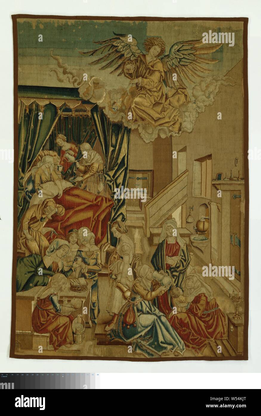 La naissance de la Vierge Marie La vie de la Vierge Marie (titre de la série), la tapisserie avec la naissance de Marie d'Albrecht Dürer. Dans son intérieur il y a un lit à baldaquin sur la gauche, dans laquelle se trouve Anna contre ses oreillers. Derrière le lit, ses deux femmes se courber, l'un avec un bol d'alcool, l'autre avec une tasse et un pichet. L'endormi Joachim est assis sur le sol à l'avant du lit. Dans l'avant-plan est une femme en rouge avec une baignoire d'eau devant elle, tenant l'enfant, derrière elle une table avec un panier à pain, autour de laquelle trois femmes sont réunies, l'un d'eux parle d'un esclave, elle tourne le dos Banque D'Images