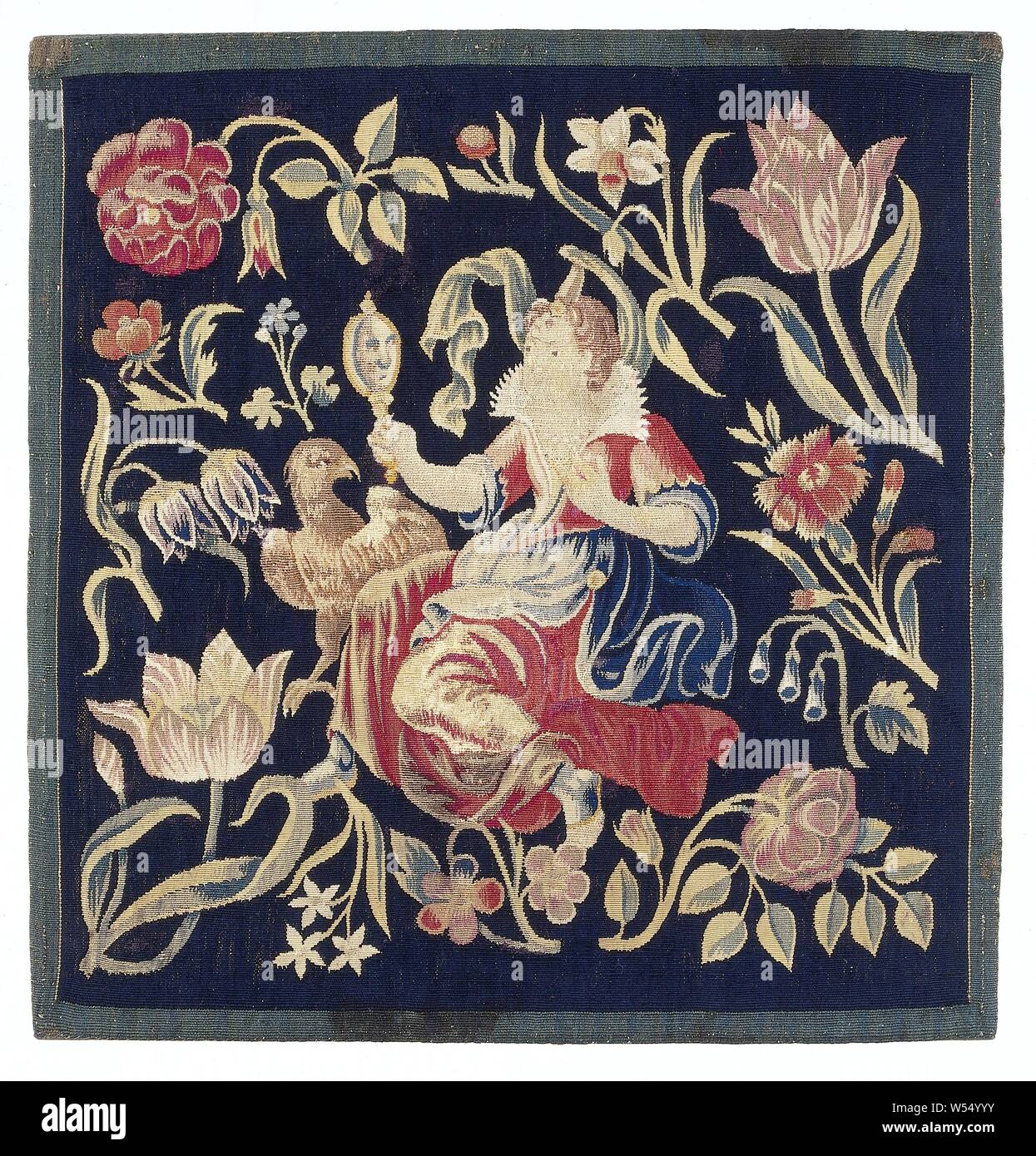 Housse de coussin avec la personnification de la face, de coussin de la tapisserie avec une des cinq phrases, le visage. Sur un carré bleu foncé une figure féminine est entouré de grandes fleurs, à gauche dans un miroir et accompagné d'un aigle. Il y a de grandes fleurs éparpillés tout autour., anonyme, nord des Pays-Bas), ch. 1650, ketting, inslag, tapisserie, h 55,0 cm × w 53,0 cm Banque D'Images