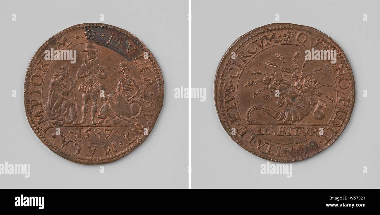 La maladie et la famine dans les Pays-Bas espagnols à la suite de la guerre, blocus, médaille de cuivre. Avers : espagnol, debout entre la faim, décrite comme une femme émaciée, assis, et de la mort, représenté comme un squelette, assis au milieu d'une arme entouré par un enveloppement, cut : an. Ar : corne de l'abondance dans un enveloppement, cut off : inscription, Belgique, anonyme, Dordrecht, 1587, cuivre (métal), frappant (métallurgie), d 3,1 cm × W 5,96 Banque D'Images