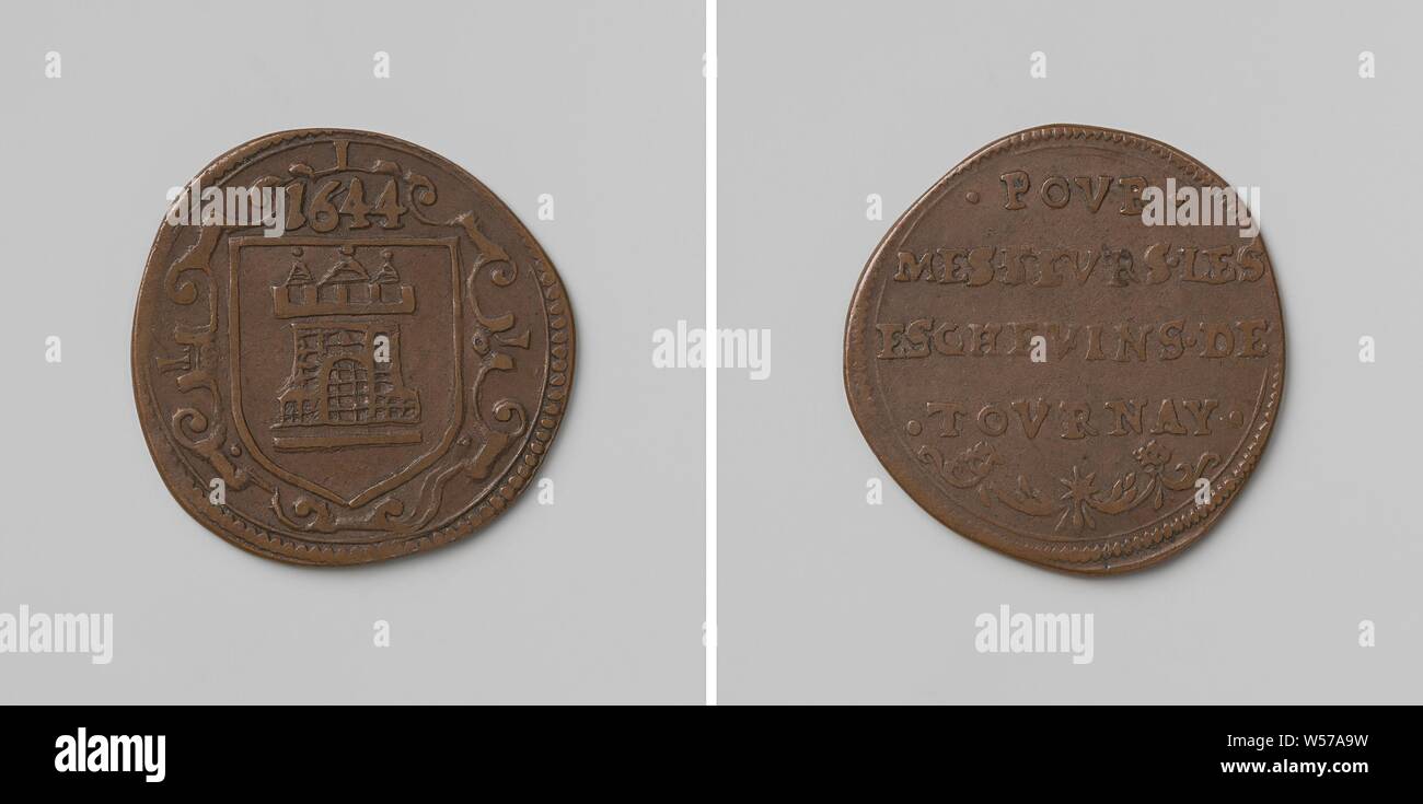 Ville de Tournai, outil pour la symbolique des échevins, le cuivre médaille. Armoiries de l'avant : en vertu de l'année en cartouche. Inverse : inscription au dessus motif décoratif, Tournai, Belgique, anonyme, 1644, cuivre (métal), frappant (métallurgie), d 2,5 cm × W 3,75 Banque D'Images