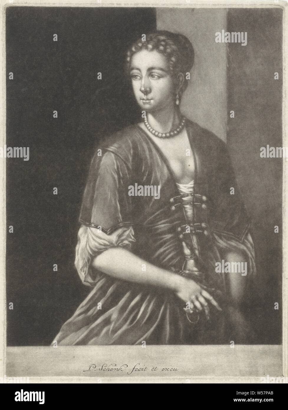 Portrait d'une jeune femme, une jeune femme avec Pearl Earrings et porte un collier de perles un chien. Un anneau à son petit doigt., Pieter Schenk (I) (mentionné sur l'objet), Amsterdam, 1670 - 1713, papier, gravure, h 247 mm × W 185 mm Banque D'Images