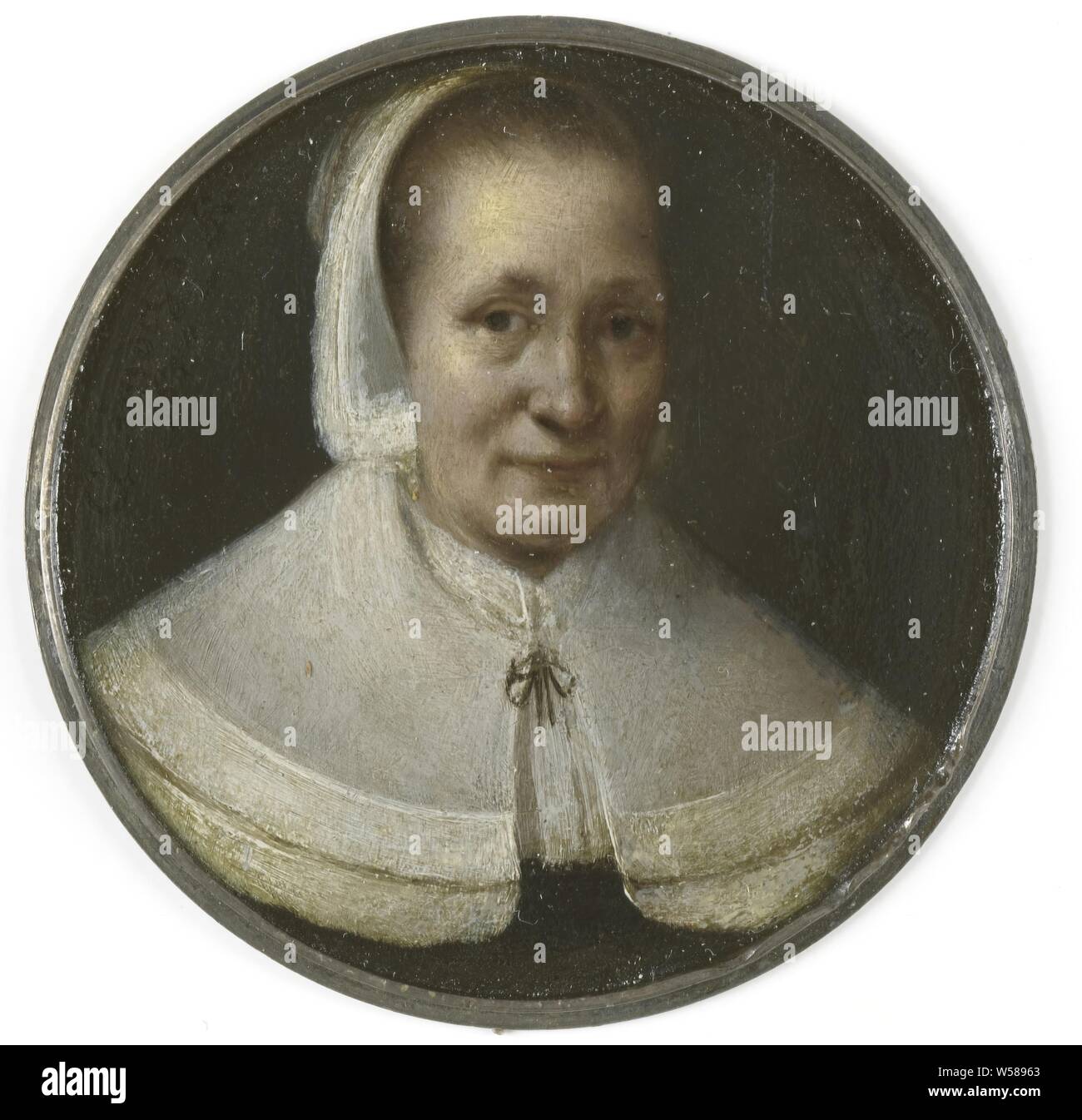 Portrait d'une femme de cinquante ans, Portrait d'une femme de cinquante ans. Buste, légèrement vers la droite. Une partie de la collection de miniatures, historique des personnes non connues de nom - BB - femme, Gerrit Lundens, 1650, de l'argent (métal), de la peinture à l'huile (peinture), d 4,8 cm × 0,2 cm d Banque D'Images