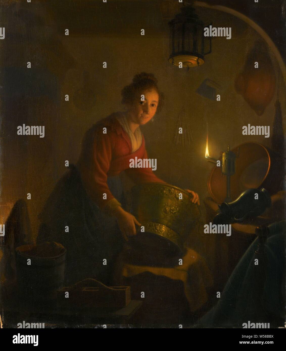 Une femme dans une cuisine aux chandelles, une femme dans une cuisine à la lumière d'une lampe à huile. Une bonne assure le ponçage et bouilloires casseroles de cuivre par la lumière de la lampe à pétrole., Michiel Versteegh, ch. 1830, tableau de bord, de la peinture à l'huile (peinture), peinture, H 49 cm × w 43 cm d 11,5 cm Banque D'Images