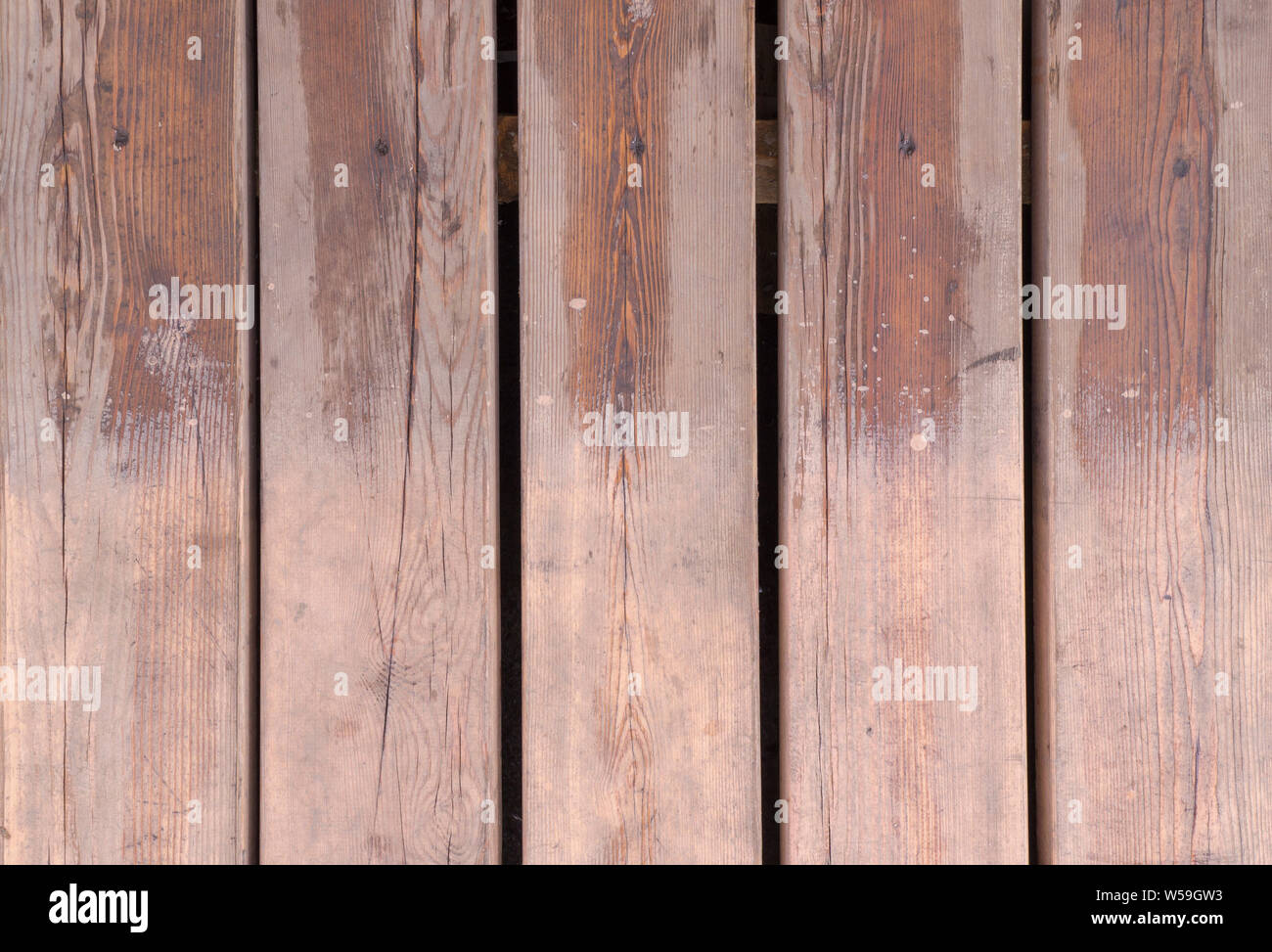 Partiellement mouillée brown des planches de fond de texture. Banque D'Images