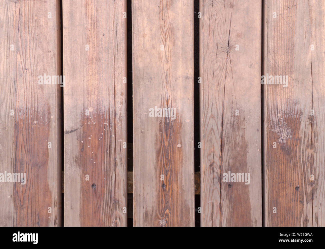 Partiellement mouillée brown des planches de fond de texture. Banque D'Images