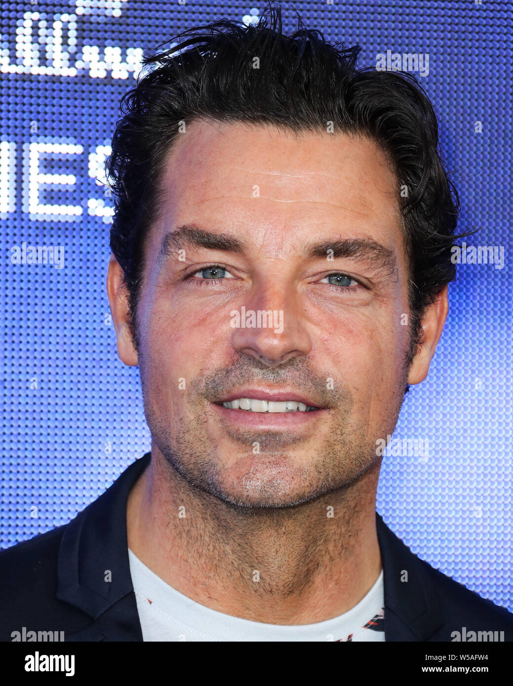 BEVERLY HILLS, LOS ANGELES, CALIFORNIE, USA - 26 juillet : Brennan Elliott arrive à l'Hallmark Channel et marque les films et les Mystères de l'été 2019 le TCA Press Tour qui a eu lieu à une résidence privée le 26 juillet 2019 à Beverly Hills, Los Angeles, Californie, États-Unis. (Photo par Xavier Collin/Image Press Office) Banque D'Images