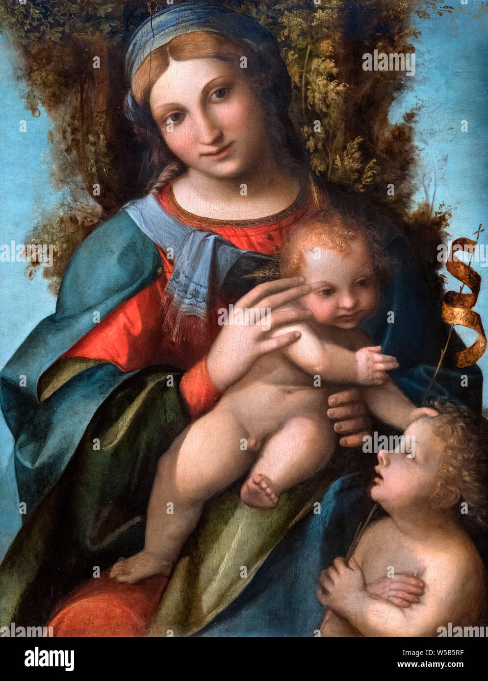 La Vierge et l'enfant avec Saint Jean Baptiste du Corrège (Antonio Allegri da Correggio, 1489-1534), huile sur panneau de bois, c.1514-15 Banque D'Images